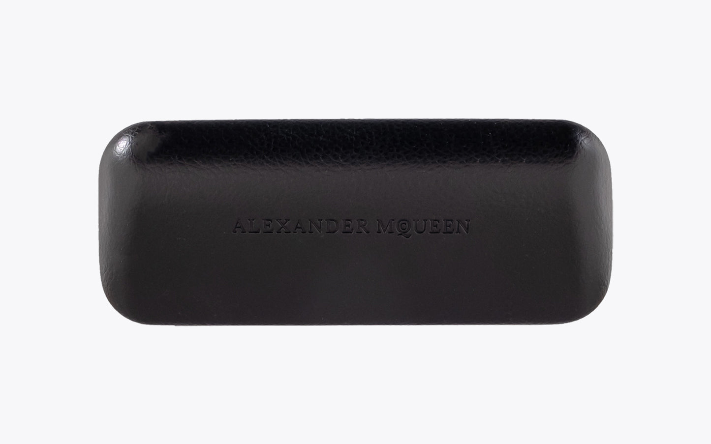 Black glasses case with 'Alexander McQueen' branding on a white background