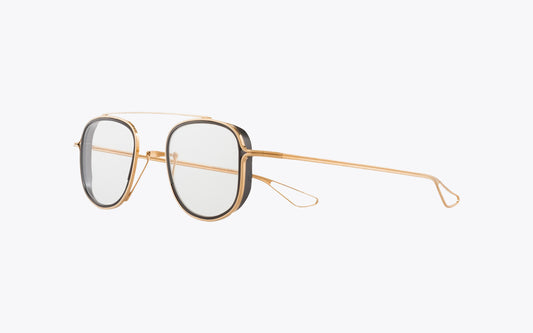 Three quarters view: gold-framed eyeglasses on a white background