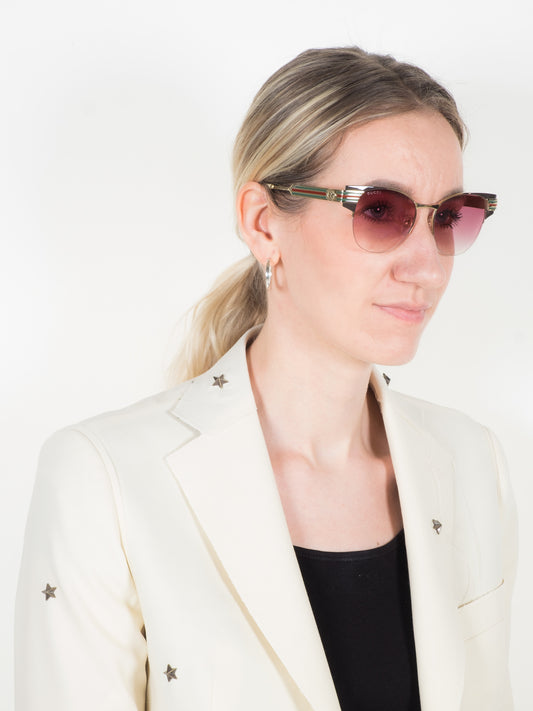 Gucci Brown/Gold Sunglasses (GG0521S) — Three-quarter View Right