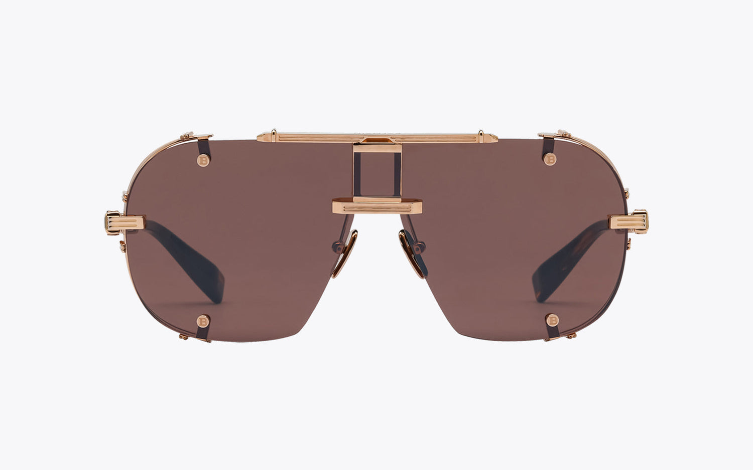The Balmain Colonel 170C | Rose Gold Unisex Sunglasses offer a sophisticated take on the classic aviator style with a bold yet elegant rimless navigator silhouette.