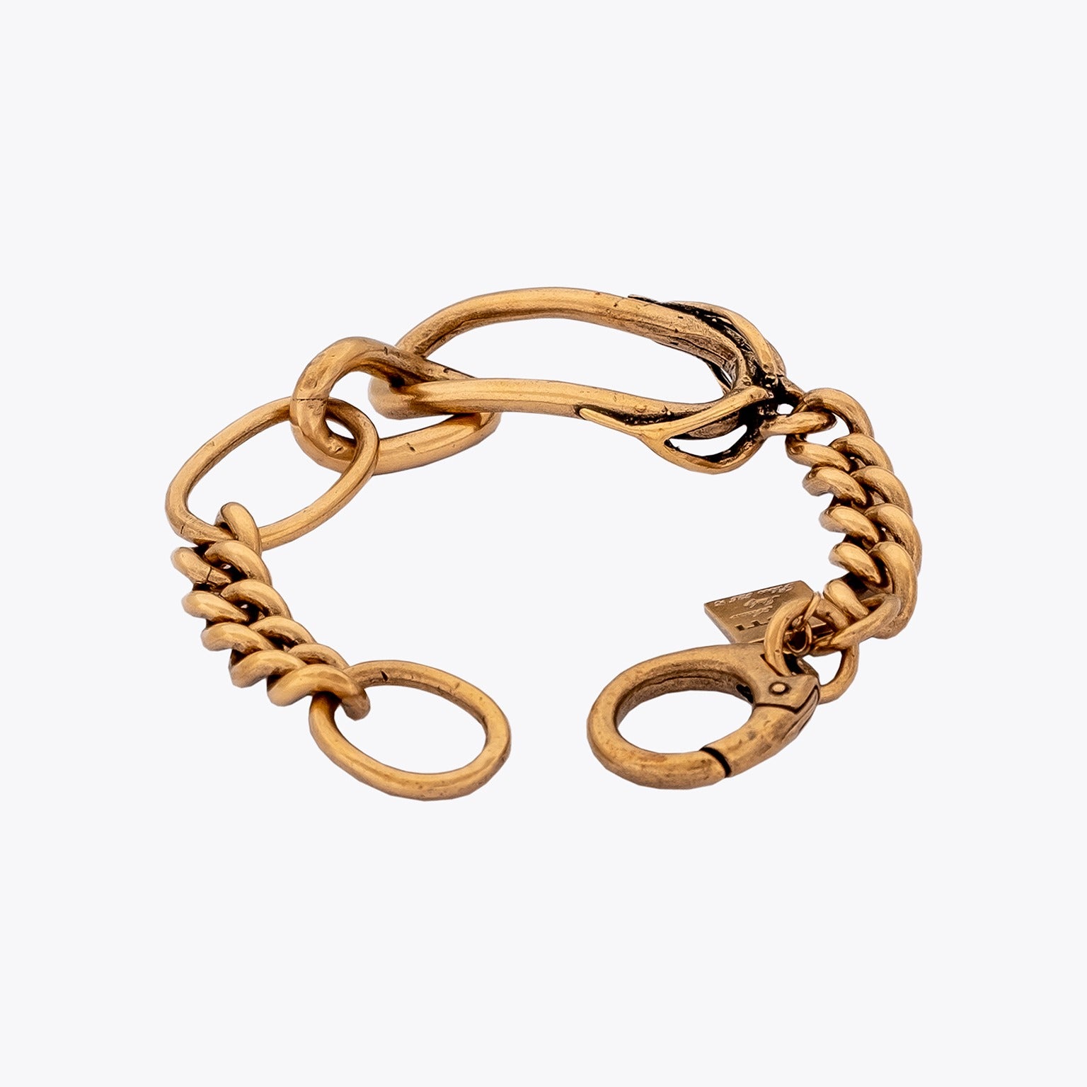 Gold-plated silver curb chain bracelet on a white background