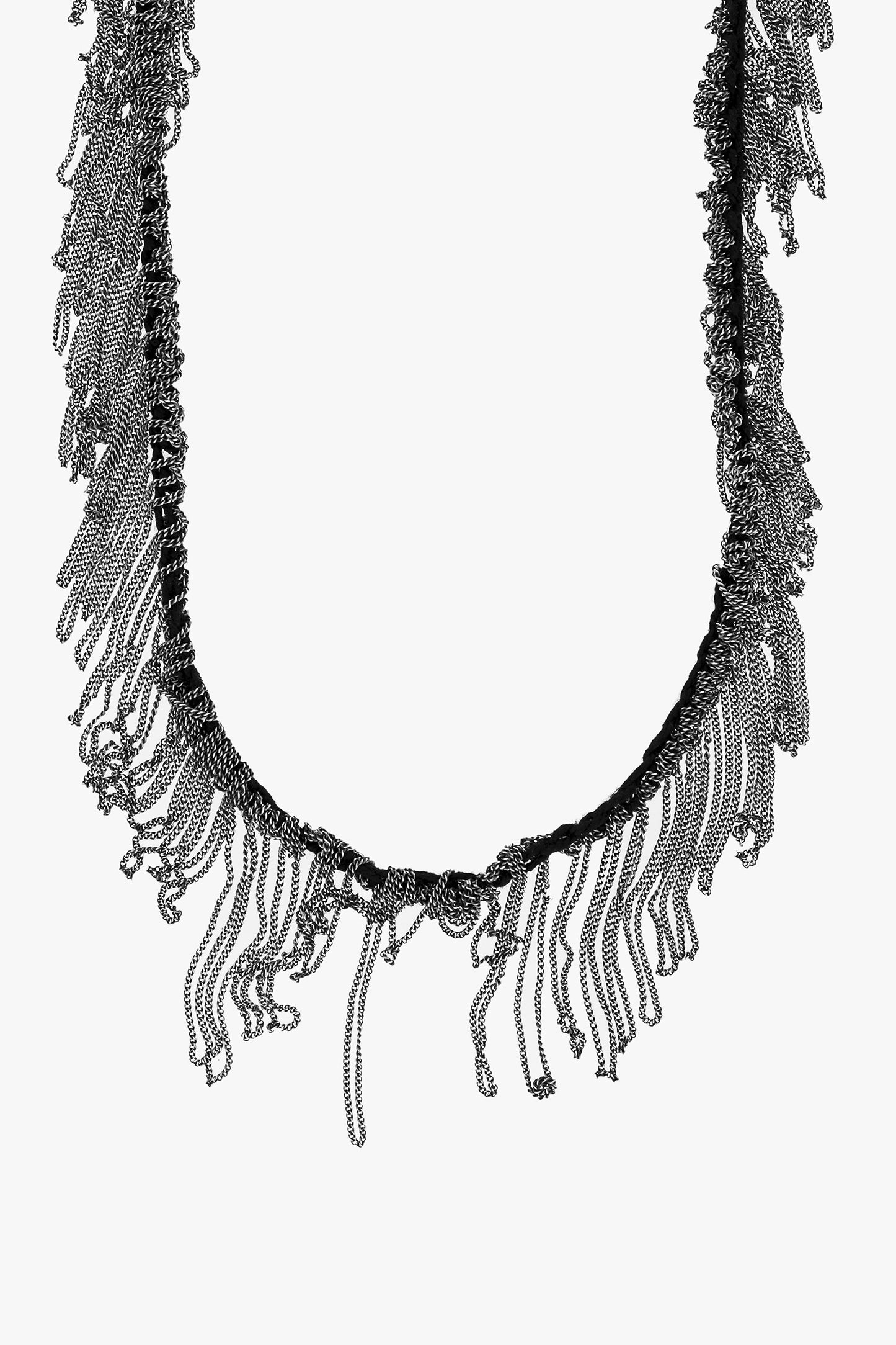 Black fringe necklace on a white background