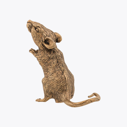 Bronze statue of a mouse on a white background