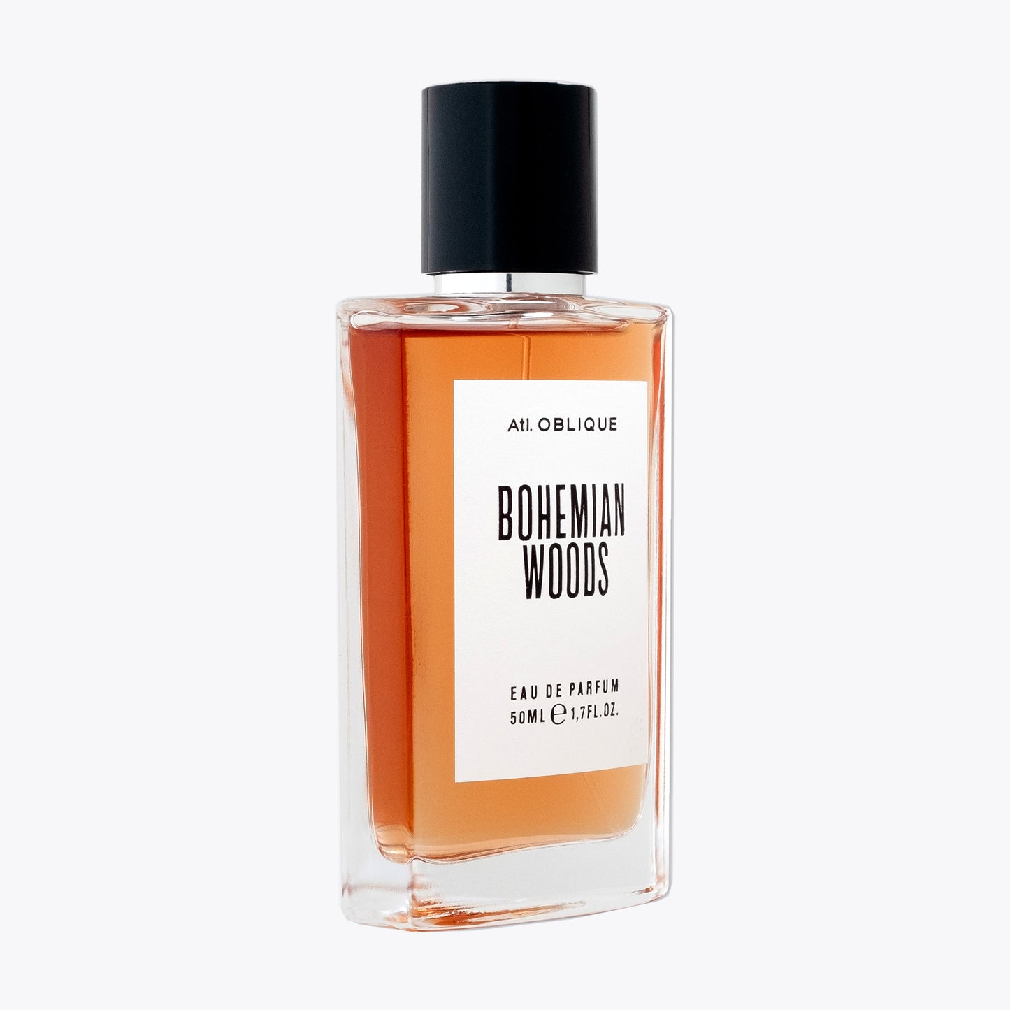 Perfume bottle labeled 'Bohemian Woods' by Atelier Oblique on a white background three quarter view